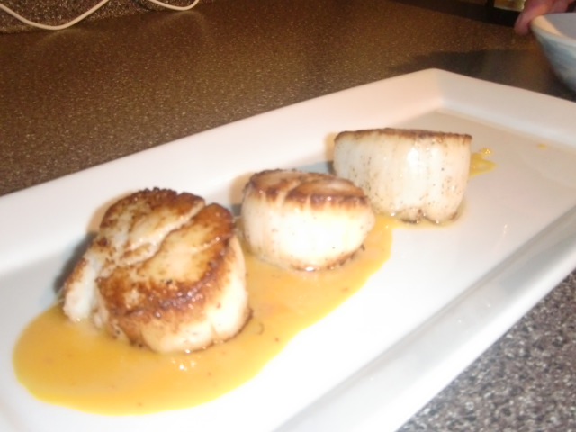 Seared Sea Scallops Over Saffron Orange Reduction